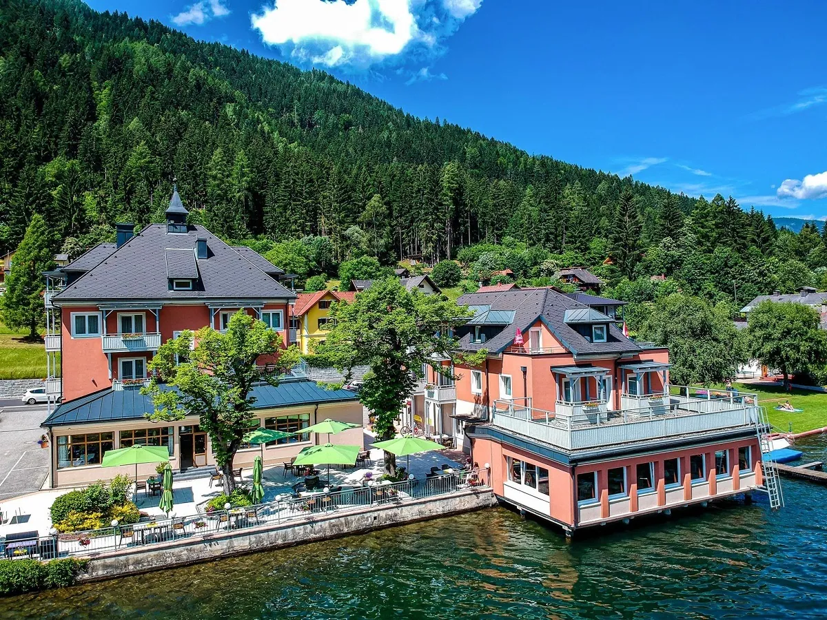 Strandhotel Burgstaller right on Lake Brennsee with its lakeside terrace in summer